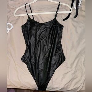 Leather black tank top. Size small. In great condition.